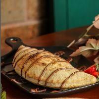 imagem Calzone de Banana c/ Canela e Chocolate Branco