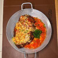 imagem Milanesa di Pollo e Gnocchi al pomodoro