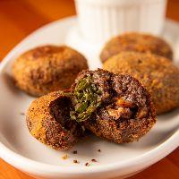 imagem Porção de Bolinho de Feijoada